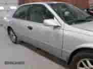 2001 Toyota Camry LE z VIN 4T1BF28K21U124768, wystawiony jako IAAI lot #43089864 z przebiegiem 246 421 mil mil oraz . Historia ofert i sprzedaży dostępna na DreamBid. Obrazek 13.