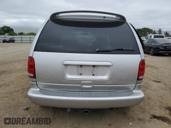 2000 Dodge Caravan SE с VIN 1B4GP45R5YB600082, выставлен на аукционе Copart как лот 54275375 с пробегом 216 840 миль миль и Списание • Salvage title. История ставок и продаж доступна на DreamBid. Изображение 6.