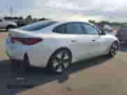 2022 BMW i4 eDrive40 with VIN WBY73AW07NFM84514, listed as a Copart auction lot 70531075 with 7,296 mi miles and Salvage title. Bid and sale history available at DreamBid. Image 3.