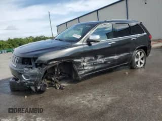 2016 Jeep Grand Cherokee High Altitude with VIN 1C4RJFCG5GC337661, listed as a Copart auction lot 63471015 with 163,030 mi miles and Salvage title. Bid and sale history available at DreamBid. Image 1.