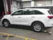 2019 Kia Sorento L with VIN 5XYPG4A34KG503490, listed as a IAAI auction lot 43218576 with 124,289 mi miles and . Bid and sale history available at DreamBid. Image 14.