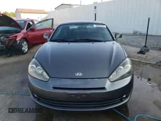 2007 Hyundai Tiburon GS с VIN KMHHM66D87U238729, выставлен на аукционе Copart как лот 68836234 с пробегом 185 898 миль миль и На запчасти • Non repairable. История ставок и продаж доступна на DreamBid. Изображение 5.