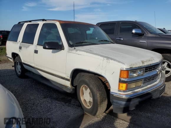 1996 Chevrolet Tahoe с VIN 1GNEC13R8TJ421533, выставлен на аукционе Copart как лот 76129824 с пробегом 190 015 миль миль и На запчасти • Non repairable. История ставок и продаж доступна на DreamBid. Изображение 4.