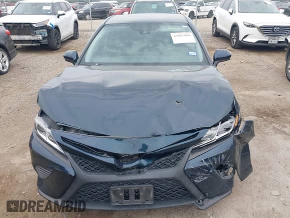 2020 Toyota Camry SE with VIN 4T1G11AK4LU955992, listed as a IAAI auction lot 43027088 with 77,002 mi miles and . Bid and sale history available at DreamBid. Image 12.