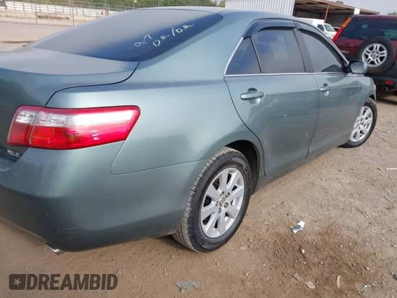 2007 Toyota Camry XLE z VIN JTNBE46K173028081, wystawiony jako IAAI lot #43234560 z przebiegiem 196 803 mil mil oraz . Historia ofert i sprzedaży dostępna na DreamBid. Obrazek 4.