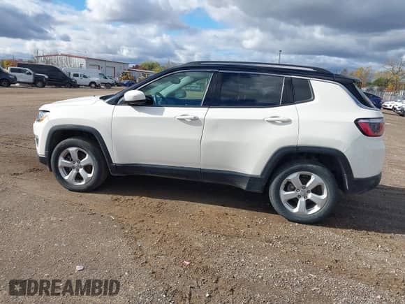 2018 Jeep Compass Latitude with VIN 3C4NJDBB3JT402558, listed as a IAAI auction lot 43544773 with 38,701 mi miles and . Bid and sale history available at DreamBid. Image 14.