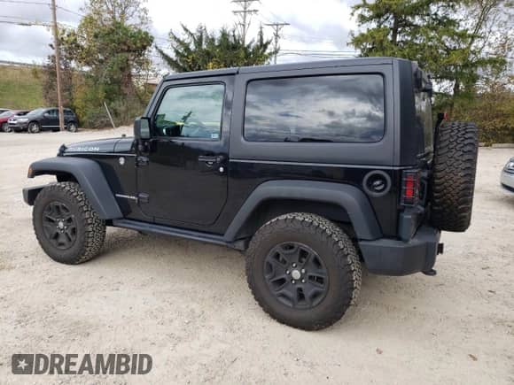 2016 Jeep Wrangler Rubicon with VIN 1C4HJWCG8GL151365, listed as a Copart auction lot 86309335 with 52,989 mi miles and Salvage title. Bid and sale history available at DreamBid. Image 2.