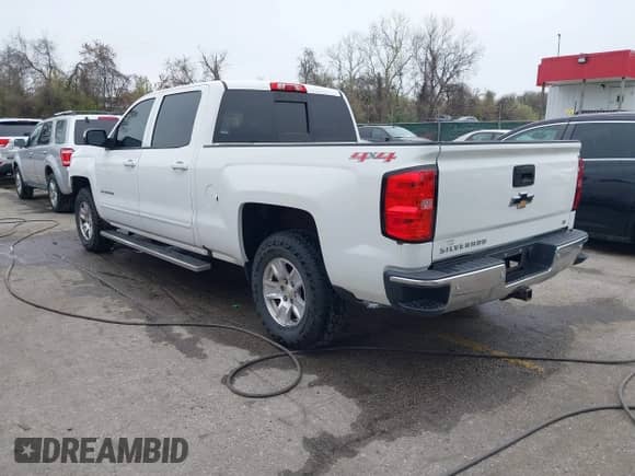 2016 Chevrolet Silverado 1500 LT with VIN 1GCUKREC3GF230027, listed as a IAAI auction lot 41981239 with 181,794 mi miles and . Bid and sale history available at DreamBid. Image 3.