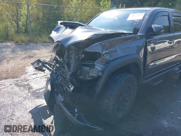 2020 Toyota Tacoma SR5 with VIN 5TFCZ5AN4LX237581, listed as a IAAI auction lot 43191708 with 126,946 mi miles and . Bid and sale history available at DreamBid. Image 18.