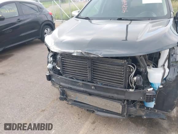 2020 Chevrolet Equinox LT z VIN 3GNAXTEV8LS597229, wystawiony jako IAAI lot #42787783 z przebiegiem 86 895 mil mil oraz . Historia ofert i sprzedaży dostępna na DreamBid. Obrazek 6.