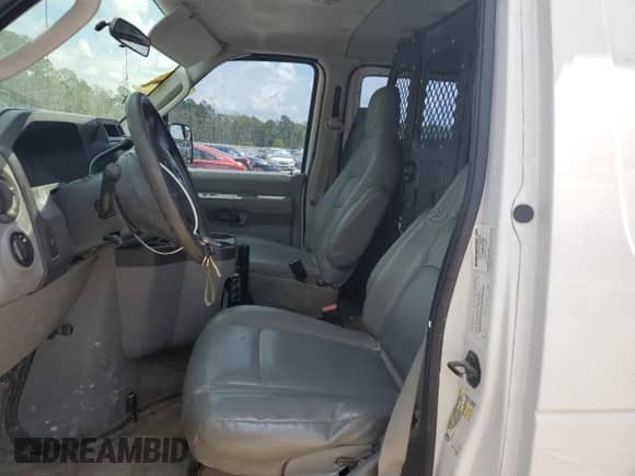 2012 Ford Econoline Cargo Commercial with VIN 1FTNE1EW0CDB17570, listed as a Copart auction lot 65319155 with 250,421 mi miles and Salvage title. Bid and sale history available at DreamBid. Image 7.