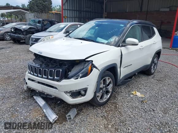 2018 Jeep Compass Limited with VIN 3C4NJCCB1JT188498, listed as a IAAI auction lot 42717751 with 84,227 mi miles and . Bid and sale history available at DreamBid. Image 2.