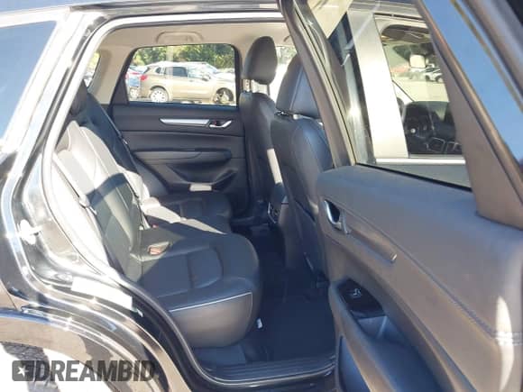 2025 Mazda CX-5 S Select z VIN JM3KFBBLXS0589143, wystawiony jako IAAI lot #43401475 z przebiegiem 24 004 mil mil oraz . Historia ofert i sprzedaży dostępna na DreamBid. Obrazek 8.