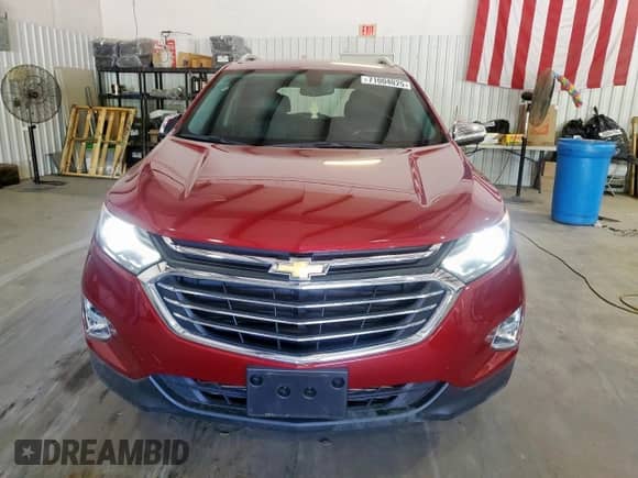 2018 Chevrolet Equinox Premier с VIN 2GNAXMEV7J6316555, выставлен на аукционе Copart как лот 71004025 с пробегом 42 425 миль миль и Списание • Salvage title. История ставок и продаж доступна на DreamBid. Изображение 5.