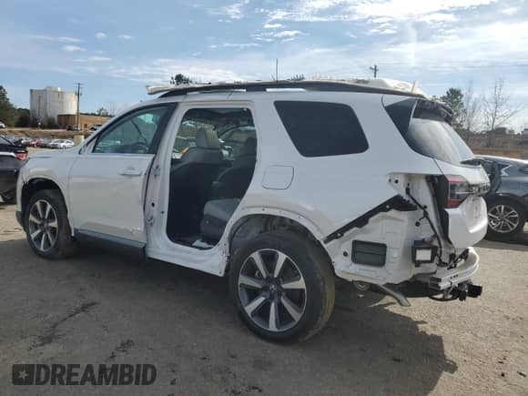 2023 Honda Pilot Touring с VIN 5FNYG2H71PB002492, выставлен на аукционе Copart как лот 41790915 с пробегом 18 450 миль миль и Списание • Salvage title. История ставок и продаж доступна на DreamBid. Изображение 2.