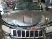 2012 Jeep Grand Cherokee Laredo z VIN 1C4RJFAG8CC158060, wystawiony jako Copart lot #86788295 z przebiegiem 132 937 mil mil oraz Szkoda całkowita • Salvage title. Historia ofert i sprzedaży dostępna na DreamBid. Obrazek 12.