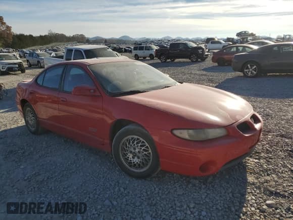 ✅ 1999 Pontiac Grand Prix GTP • VIN: 1G2WR5218XF202213 • Lot: 83345284. Listed on Copart with 215,907 mi. Free auction sales archive from the USA and detailed vehicle history report at DreamBid. Image 4.
