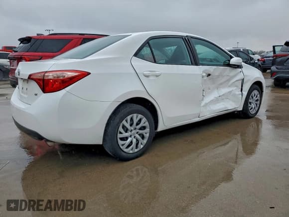 ✅ 2018 Toyota Corolla SE • VIN: 5YFBURHE1JP801769 • Lot: 94480485. Listed on Copart with 81,483 mi. Free auction sales archive from the USA and detailed vehicle history report at DreamBid. Image 3.