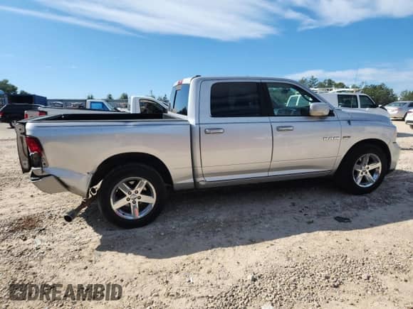 2009 Dodge 1500 Sport with VIN 1D3HB13T69S710103, listed as a Copart auction lot 80182515 with 197,933 mi miles and Salvage title. Bid and sale history available at DreamBid. Image 3.