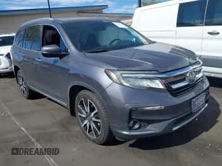 ✅ 2019 Honda Pilot Touring 7-Passenger • VIN: 5FNYF6H60KB023084 • Lot: 43504612. Listed on IAAI with 58,285 mi. Free auction sales archive from the USA and detailed vehicle history report at DreamBid. Image 1.
