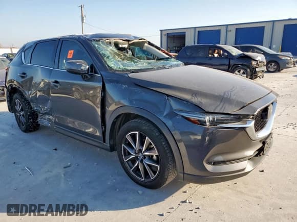 ✅ 2018 Mazda CX-5 Grand Touring • VIN: JM3KFADM1J1353912 • Lot: 93142365. Listed on Copart with Not provided. Free auction sales archive from the USA and detailed vehicle history report at DreamBid. Image 4.