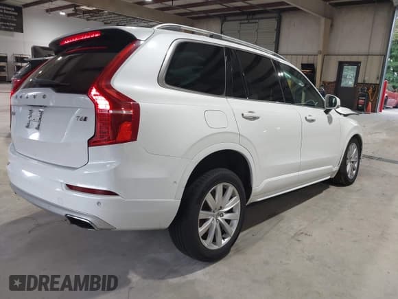 ✅ 2017 Volvo XC90 Momentum • VIN: YV4A22PK5H1106836 • Lot: 43305180. Listed on IAAI with 185,009 mi. Free auction sales archive from the USA and detailed vehicle history report at DreamBid. Image 4.