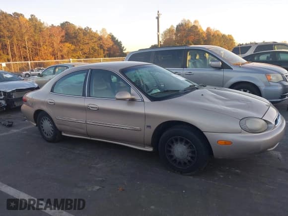 ✅ 1999 Mercury Sable LS • VIN: 1MEFM53SXXA647145 • Lot: 43602157. Listed on IAAI with 184,332 mi. Free auction sales archive from the USA and detailed vehicle history report at DreamBid. Image 13.