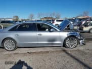 ✅ 2015 Audi A8 3.0T • VIN: WAU3GAFD7FN006279 • Lot: 43687493. Wystawiony na IAAI z przebiegiem 123 456 mil. Bezpłatny archiwum sprzedaży aukcyjnych z USA i szczegółowy raport historii pojazdu na DreamBid. Zdjęcie 14.
