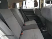 ✅ 2010 Dodge Caliber • VIN: 1B3CB1HA8AD587747 • Лот: 83140504. Опубликован ранее на Copart с пробегом 174 208 миль. Бесплатный доступ к архиву аукционных продаж из США и подробный отчёт об истории автомобиля на DreamBid. Изображение 10.