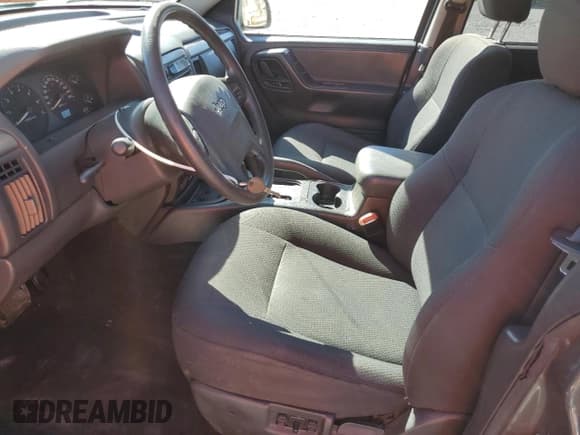 ✅ 2004 Jeep Grand Cherokee Laredo • VIN: 1J4GW48S44C311908 • Лот: 82457435. Опубликован ранее на Copart с пробегом 114 107 миль. Бесплатный доступ к архиву аукционных продаж из США и подробный отчёт об истории автомобиля на DreamBid. Изображение 7.