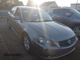 ✅ 2005 Nissan Altima SE • VIN: 1N4BL11D55N455191 • Lot: 43700301. Listed on IAAI with 109,938 mi. Free auction sales archive from the USA and detailed vehicle history report at DreamBid. Image 1.