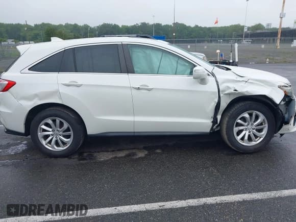 ✅ 2018 Acura RDX • VIN: 5J8TB4H31JL018201 • Lot: 42459595. Listed on IAAI with 106,523 mi. Free auction sales archive from the USA and detailed vehicle history report at DreamBid. Image 13.