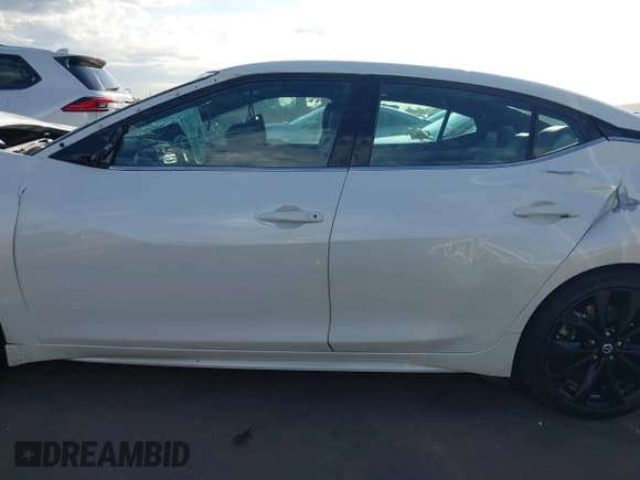 ✅ 2020 Nissan Maxima SR • VIN: 1N4AA6EV5LC385959 • Lot: 43395844. Listed on IAAI with 120,332 mi. Free auction sales archive from the USA and detailed vehicle history report at DreamBid. Image 14.