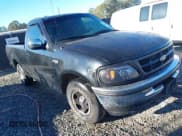 ✅ 1997 Ford F-150 • VIN: 1FTDF17W0VNC22726 • Lot: 43728081. Listed on IAAI with 194,836 mi. Free auction sales archive from the USA and detailed vehicle history report at DreamBid. Image 1.