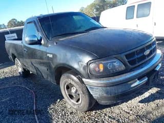 ✅ 1997 Ford F-150 • VIN: 1FTDF17W0VNC22726 • Lot: 43728081. Listed on IAAI with 194,836 mi. Free auction sales archive from the USA and detailed vehicle history report at DreamBid. Image 1.