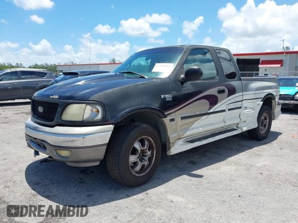 ✅ 1999 Ford F-150 XL • VIN: 1FTRX08L5XKA87944 • Lot: 42741901. Listed on IAAI with Not provided. Free auction sales archive from the USA and detailed vehicle history report at DreamBid. Image 2.