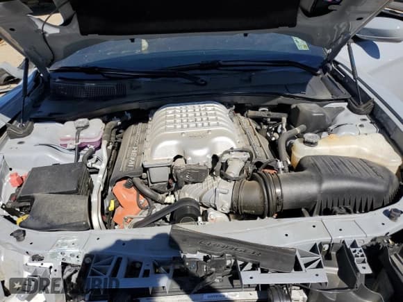 ✅ 2022 Dodge Charger SRT Hellcat Widebody • VIN: 2C3CDXL98NH210518 • Лот: 82744645. Опубликован ранее на Copart с пробегом 30 521 миль. Бесплатный доступ к архиву аукционных продаж из США и подробный отчёт об истории автомобиля на DreamBid. Изображение 11.