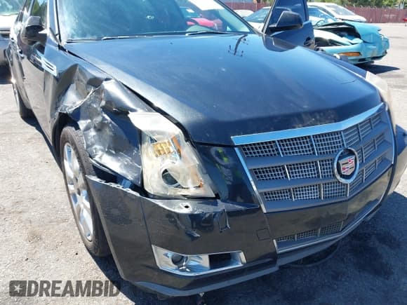 ✅ 2009 Cadillac CTS RWD • VIN: 1G6DV57V690169781 • Lot: 42831076. Wystawiony na IAAI z przebiegiem 154 568 mil. Bezpłatny archiwum sprzedaży aukcyjnych z USA i szczegółowy raport historii pojazdu na DreamBid. Zdjęcie 14.