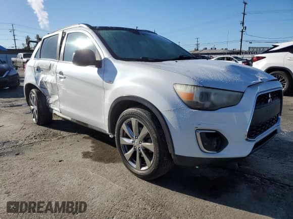 2013 Mitsubishi Outlander LE with VIN 4A4AP5AU0DE022676, listed as a Copart auction lot 86818835 with 221,484 mi miles and Salvage title. Bid and sale history available at DreamBid. Image 4.