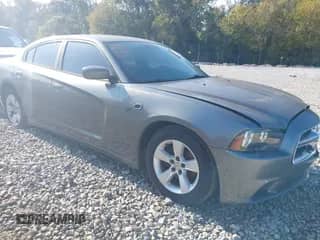 2012 Dodge Charger SE with VIN 2C3CDXBG2CH240031, listed as a IAAI auction lot 43374868 with 203,154 mi miles and . Bid and sale history available at DreamBid. Image 1.