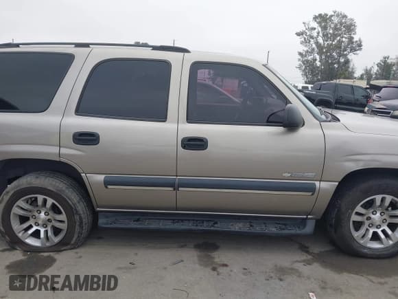 ✅ 2003 Chevrolet Tahoe LS • VIN: 1GNEC13VX3R280897 • Lot: 42160188. Listed on IAAI with 208,742 mi. Free auction sales archive from the USA and detailed vehicle history report at DreamBid. Image 13.