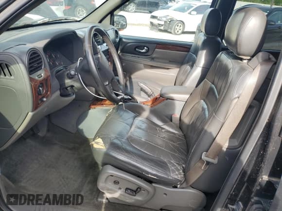 ✅ 2003 GMC Envoy SLT • VIN: 1GKET16S136129088 • Lot: 55842055. Listed on Copart with 185,473 mi. Free auction sales archive from the USA and detailed vehicle history report at DreamBid. Image 7.