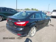 ✅ 2014 Ford Focus Titanium • VIN: 1FADP3J23EL237429 • Lot: 43358765. Listed on IAAI with 138,960 mi. Free auction sales archive from the USA and detailed vehicle history report at DreamBid. Image 4.