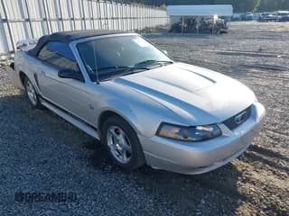 ✅ 2004 Ford Mustang Deluxe • VIN: 1FAFP44684F133237 • Lot: 43309110. Listed on IAAI with 159,217 mi. Free auction sales archive from the USA and detailed vehicle history report at DreamBid. Image 1.