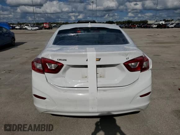 2018 Chevrolet Cruze LT z VIN 1G1BE5SM0J7246944, wystawiony jako Copart lot #70740502 z przebiegiem 73 133 mil mil oraz . Historia ofert i sprzedaży dostępna na DreamBid. Obrazek 6.