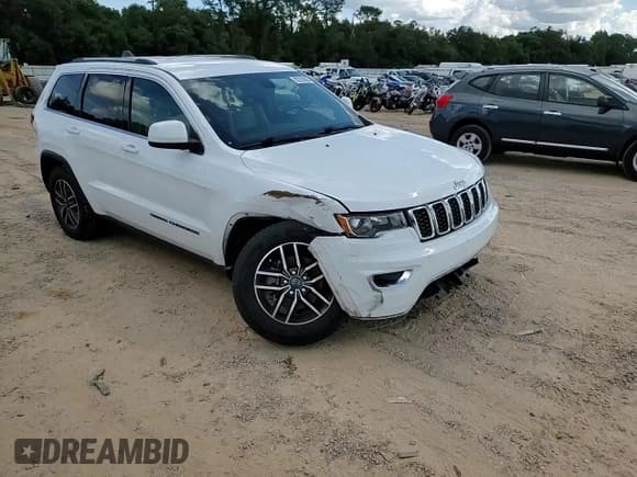 ✅ 2020 Jeep Grand Cherokee Laredo E • VIN: 1C4RJFAG0LC144119 • Lot: 82314265. Listed on Copart with 109,395 mi. Free auction sales archive from the USA and detailed vehicle history report at DreamBid. Image 14.