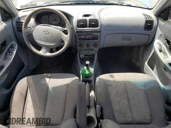 2004 Hyundai Accent GL z VIN KMHCG45C94U574027, wystawiony jako Copart lot #57463905 z przebiegiem 139 595 mil mil oraz Szkoda całkowita • Salvage title. Historia ofert i sprzedaży dostępna na DreamBid. Obrazek 8.