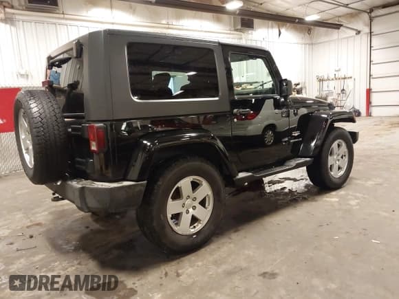 ✅ 2007 Jeep Wrangler Sahara • VIN: 1J8FA54167L197023 • Лот: 42435685. Опубликован ранее на IAAI с пробегом 115 282 миль. Бесплатный доступ к архиву аукционных продаж из США и подробный отчёт об истории автомобиля на DreamBid. Изображение 4.