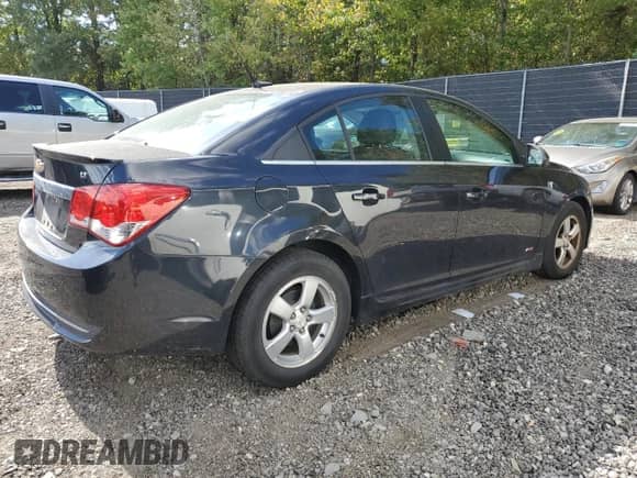 2013 Chevrolet Cruze 1LT with VIN 1G1PC5SB9D7273946, listed as a Copart auction lot 63820815 with 76,692 mi miles and Salvage title. Bid and sale history available at DreamBid. Image 3.