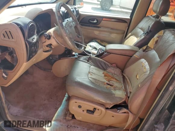 ✅ 2002 GMC Envoy SLT • VIN: 1GKDS13S422274313 • Лот: 66917725. Опубликован ранее на Copart с пробегом 321 743 миль. Бесплатный доступ к архиву аукционных продаж из США и подробный отчёт об истории автомобиля на DreamBid. Изображение 7.